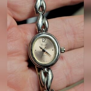 Ladies Osiroc champagne dial, silver  bracelet watch